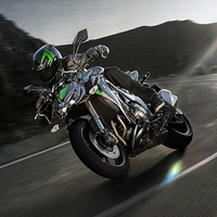 Kawasaki Pre Owned - In The Image: A Motorcycle Running In The Road
